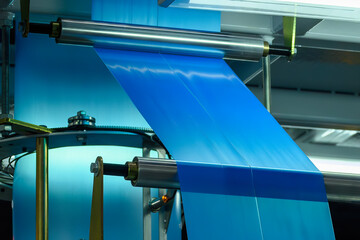 The mass production of plastic bags.