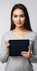 Fototapeta premium Woman holding a digital tablet isolated on white background.