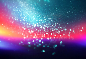 Abstract teal and white bokeh on a dark background.