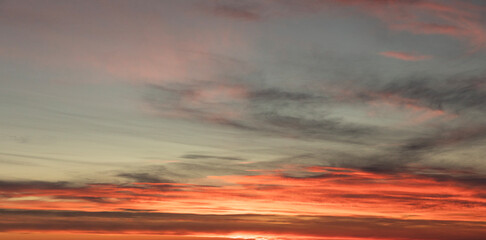Fototapeta premium Beautiful high up mountains sunset after clear sky in autumn with burnt orange tones