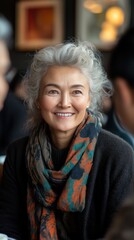 Two friends share a warm moment in a café, showcasing their genuine expressions and laughter