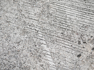 Detailed close-up of textured concrete surface urban environment abstract photography industrial setting minimalist perspective design aesthetic