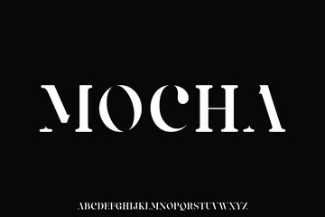 Obraz premium Elegant vintage stencil type style alphabet display font vector. Mocha typeface