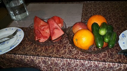 A close-up of fresh vegetables on a wooden table, showcasing vibrant colors and natural textures, ideal for healthy living and cooking themes.
