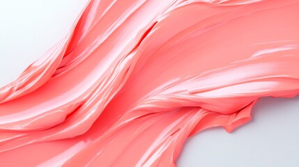 A pink blob of paint with a wavy line