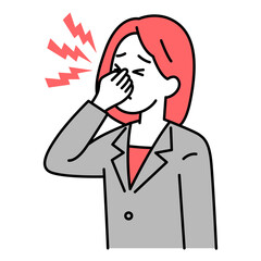 眼精疲労がつらいスーツの女性