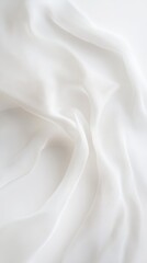 Obraz premium Abstract White Fabric Texture: Subtle, elegant, and minimalist, this image captures the soft, flowing texture of white fabric, creating a serene and sophisticated backdrop.