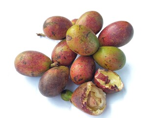 Exotic fruit from Papua, Indonesia called by Matoa fruit on a white background