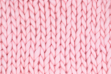 Close-Up of Bright Pink Chunky Knit Wool Texture – Perfect for Cozy Home Decor, Knitting...