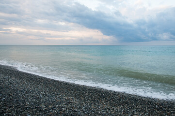 Picturesque cloudy skyline at sunrise over Black Sea coast in Dagomys, Sochi, Russian Federation