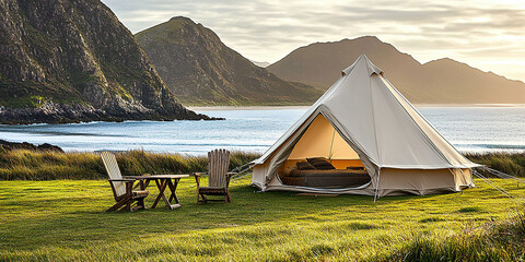 The concept of tents and camping lifestyle on the seaside lawn