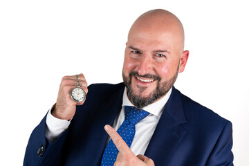 portrait of businessman in blue suit and tie with friendly expression showing pocket watch isolated on white background