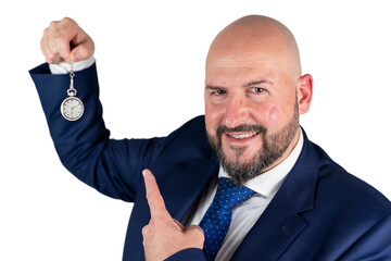 portrait of businessman in blue suit and tie with friendly expression showing pocket watch isolated on white background