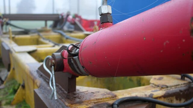 Steel hydraulic piston to trailer tractor, close up detail