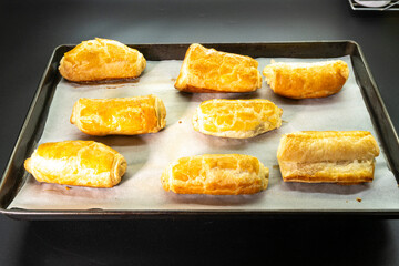 Chocolate rolls made of puff pastry. Dessert. Pastry. Food concept. Puff pastry sticks