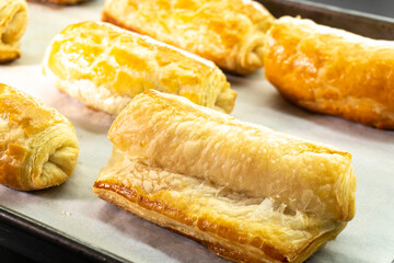 Chocolate rolls made of puff pastry. Dessert. Pastry. Food concept. Puff pastry sticks