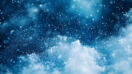 Abstract background of snow and falling snowflake particle bokeh blur