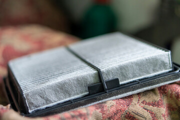 Car repair service center. Car engine diagnostics and testing. Using air cleaning filter for engine