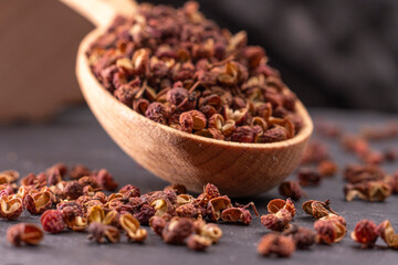 Close up of traditional Chinese spice. Sichuan peppercorns. Sichuan pepper often used in Chinese and Asian cooking for spicy meals. Food concept