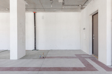 interior of the apartment without decoration in gray colors. rough finish