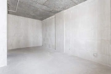 interior of the apartment without decoration in gray colors. rough finish