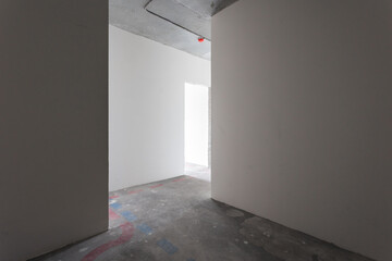 interior of the apartment without decoration in gray colors. rough finish
