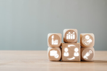 Business-to-Business Concept with Wooden Blocks and Icons Representing Collaboration and...