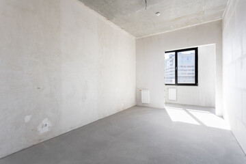 interior of the apartment without decoration in gray colors. rough finish