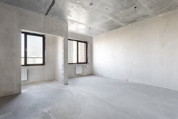 interior of the apartment without decoration in gray colors. rough finish