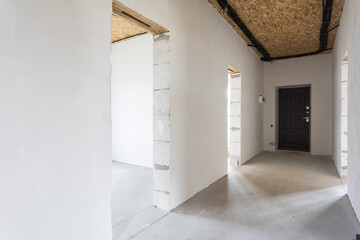 interior of the apartment without decoration in gray colors. rough finish