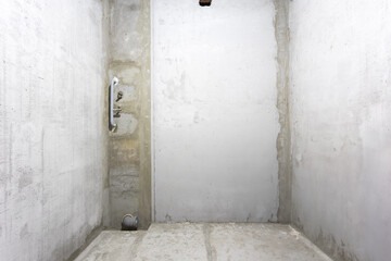 interior of the apartment without decoration in gray colors. rough finish