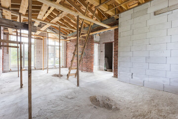 interior of the apartment without decoration in gray colors. rough finish