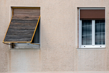 windows on the facade of an apartment building in Athens, Greece 
