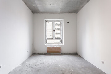 interior of the apartment without decoration in gray colors. rough finish