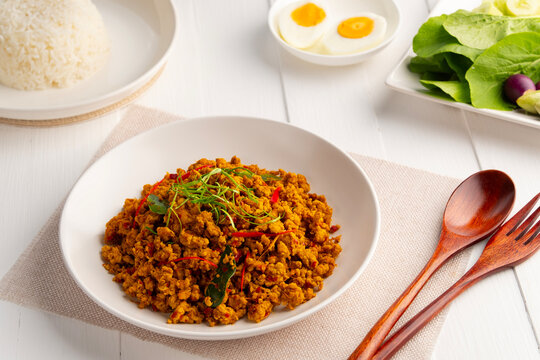 Southern Stir Fried ground pork with Yellow Curry Paste in white plate.Southern Style and Aromatic(Kuo Kling)