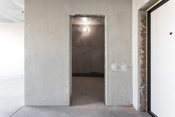 interior of the apartment without decoration in gray colors. rough finish