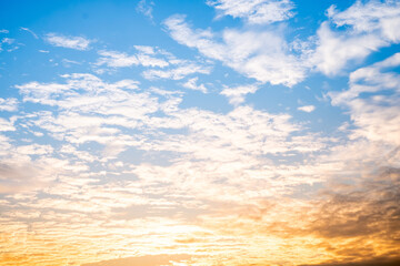 Beautiful , luxury soft gradient orange gold clouds and sunlight on the blue sky perfect for the background, take in everning,Twilight, Large size, high definition landscape photo