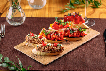 Side view on set of assorted gourmet bruschettas