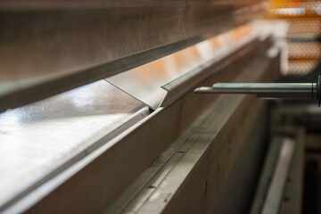 Aluminum Press Brake machine up close in detail with 3 millimeter aluminum 90 degrees bent with a...