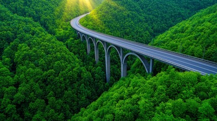 A winding bridge spans lush green hills, showcasing nature's beauty and engineering marvels in a serene landscape under soft sunlight.