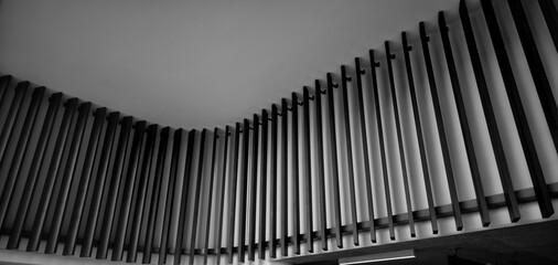 Circular Wooden Plank Design on a Curving Corner Wall.