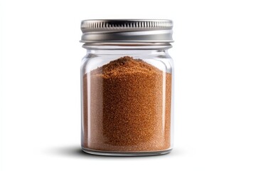 A clear jar filled with rich brown spice, perfect for culinary creativity.