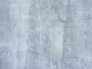 Surface wall concrete pattern for background. Abstract concrete wall surface for vintage background. The unfinished wall surface is grayish white with a hint of denim blue