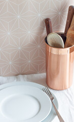 Kitchen Counter with White Plate and Utencils
