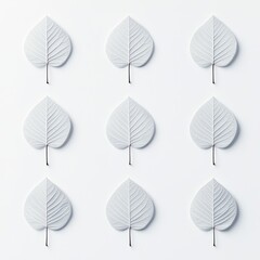 A minimalist arrangement of white leaf motifs, creating a soothing and calm visual impact in contemporary design.