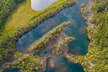 Lakes with rocky shores in the middle of a forest is a typical glacial landscape of the Republic of...