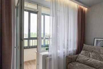 interior apartment room balcony overlooking the street