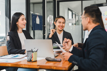Professional team meeting in modern office, discussing strategies and ideas. atmosphere is collaborative and focused, showcasing teamwork and communication