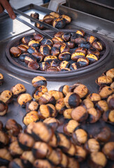 Fried chestnut vendor. street food. 