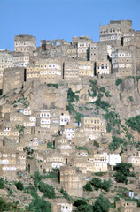 Fototapeta premium The village of Al Hajjarah on Jabal Haraz mountains in Yemen at sunset